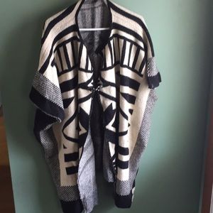 Cream and black poncho